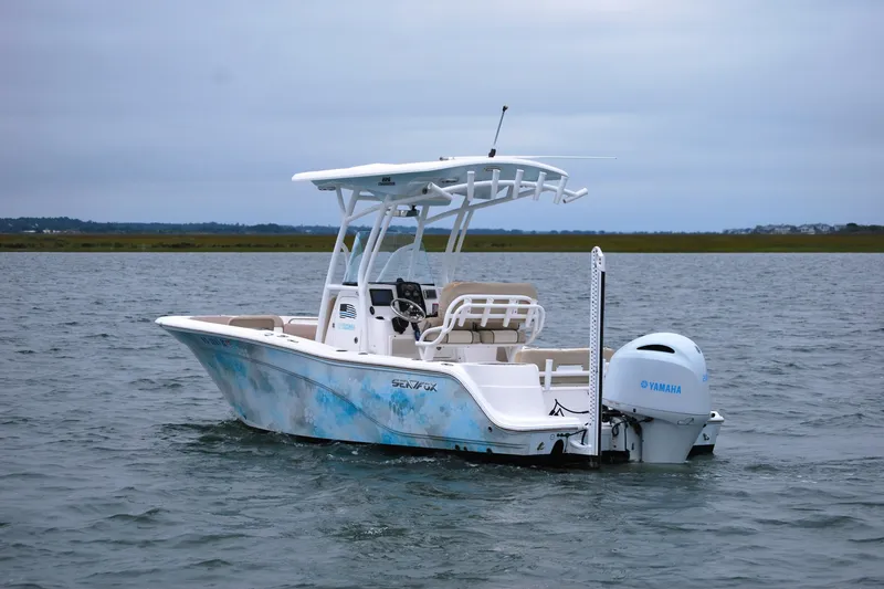 Slide: The Image of 2018 Sea Fox 226 Commander boat on water with Yamaha engine. - 3