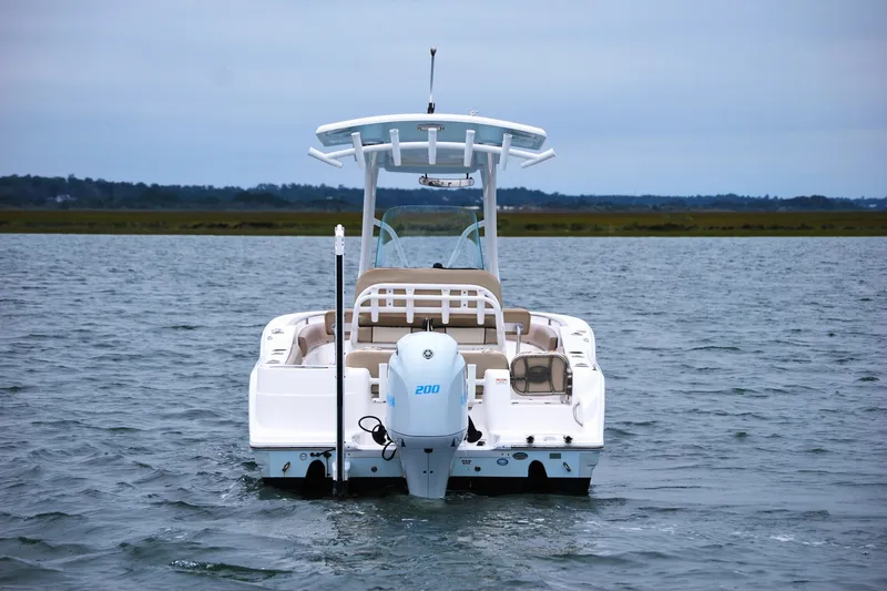 Slide: The Image of 2018 Sea Fox 226 Commander boat on calm water, rear view. - 4
