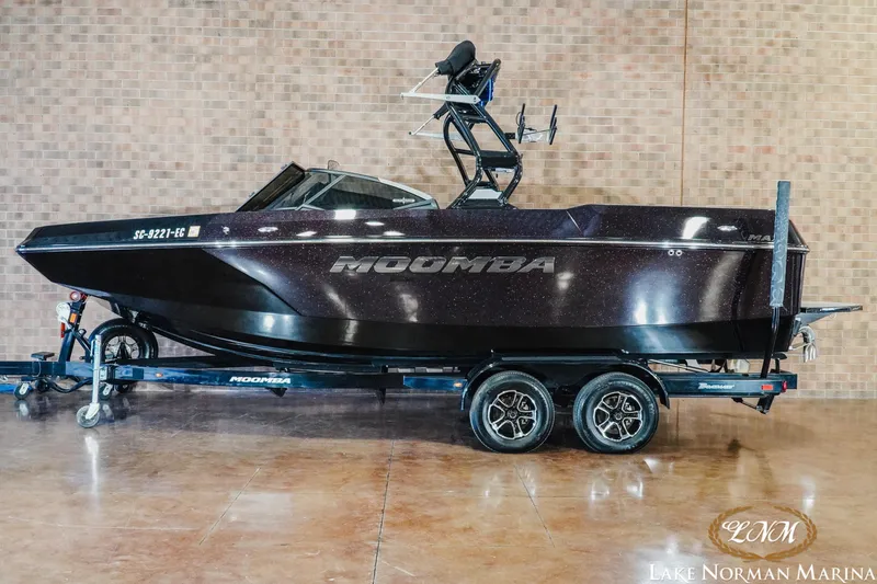 The Image of 2023 Moomba Max boat on trailer at Lake Norman Marina showroom. - 1