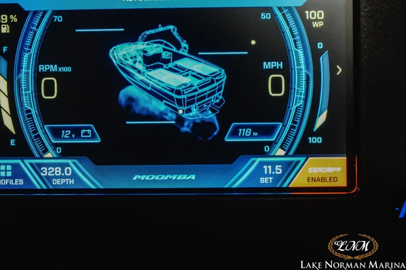 Slide: The Image of Digital dashboard of 2023 Moomba Max boat displaying speed, RPM, and depth. - 22