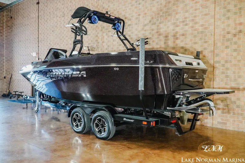 Slide: The Image of 2023 Moomba Max boat on trailer at Lake Norman Marina showroom. - 3