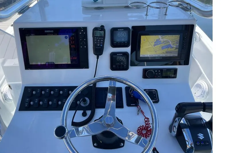 Slide: The Image of Helm of 2006 Dusky 278 Open Fisherman with navigation and control systems. - 3