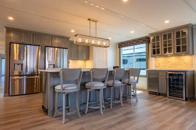 Slide: The Image of Luxurious kitchen in 2026 Sumerset Luxe III houseboat with modern appliances and elegant design. - 10