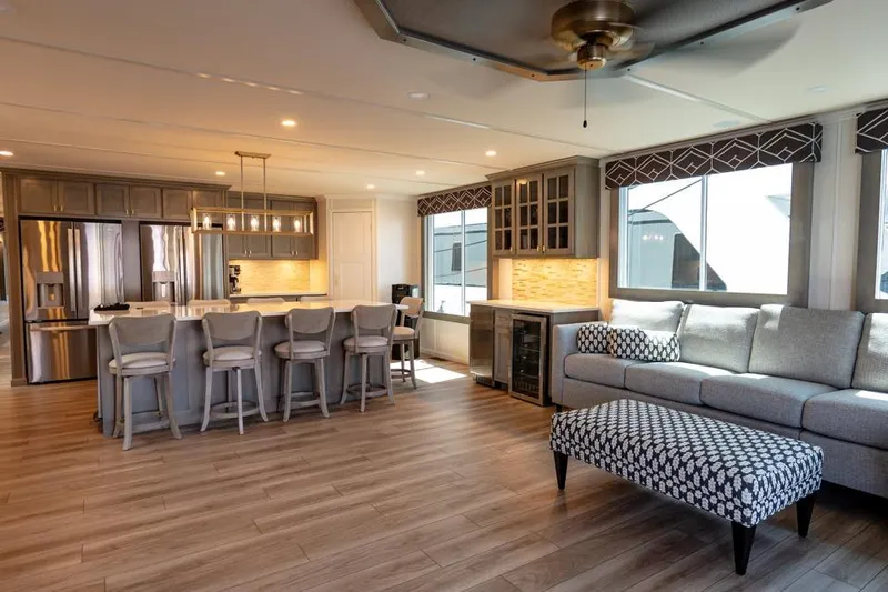 Slide: The Image of Luxurious Sumerset Luxe III 2026 houseboat interior with modern kitchen and cozy living area. - 12