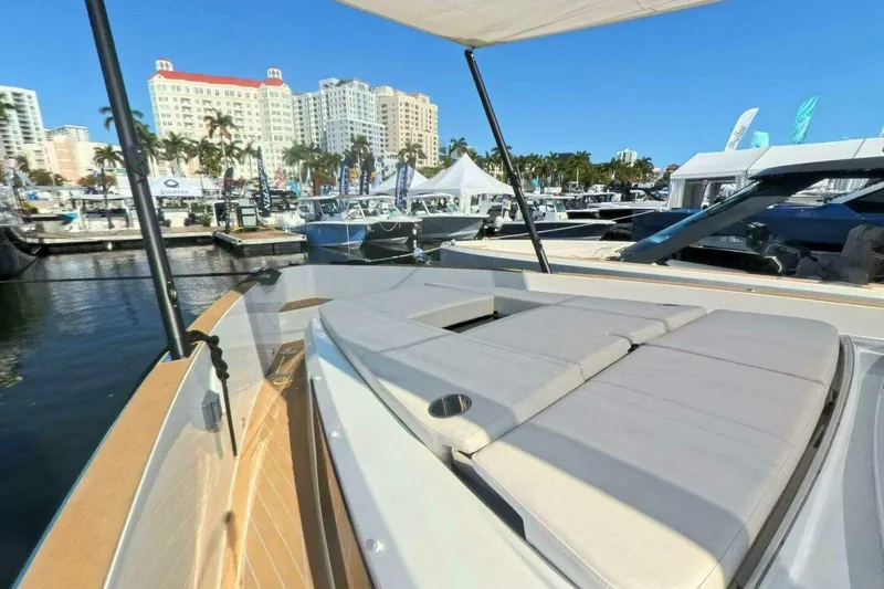 Slide: The Image of 2024 Fjord 41XP yacht at marina with cityscape background. - 10