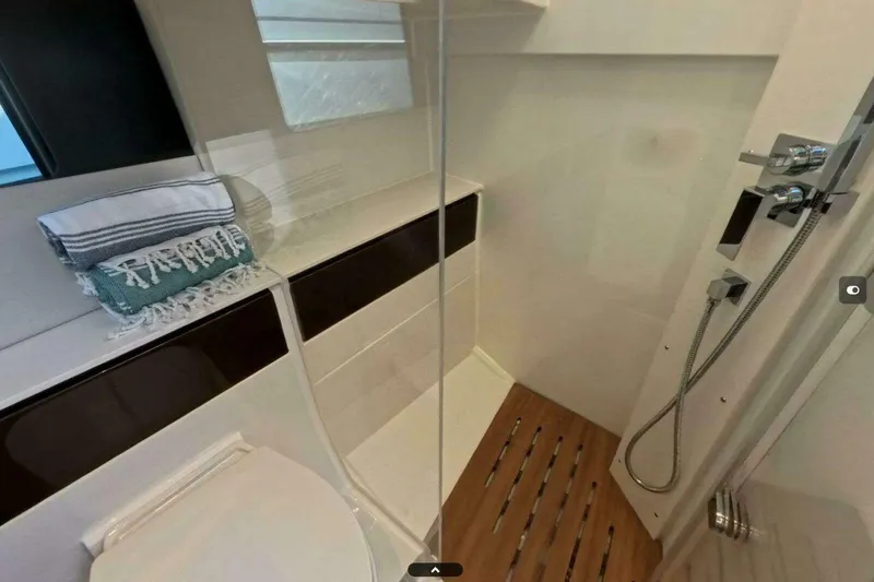 Slide: The Image of Modern bathroom in 2024 Fjord 41XP yacht with shower and towels. - 15