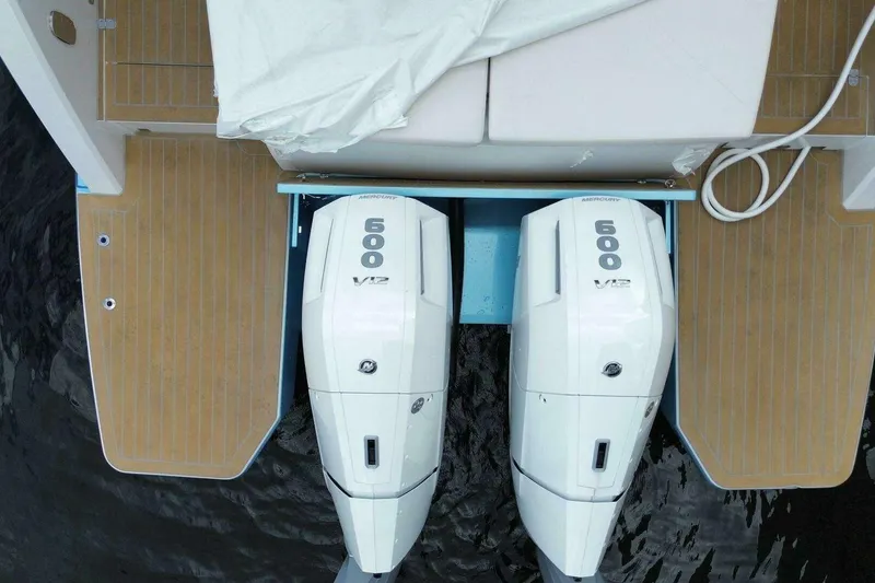 Slide: The Image of Top view of 2024 Fjord 41XP boat with twin Mercury 600 V12 engines. - 5