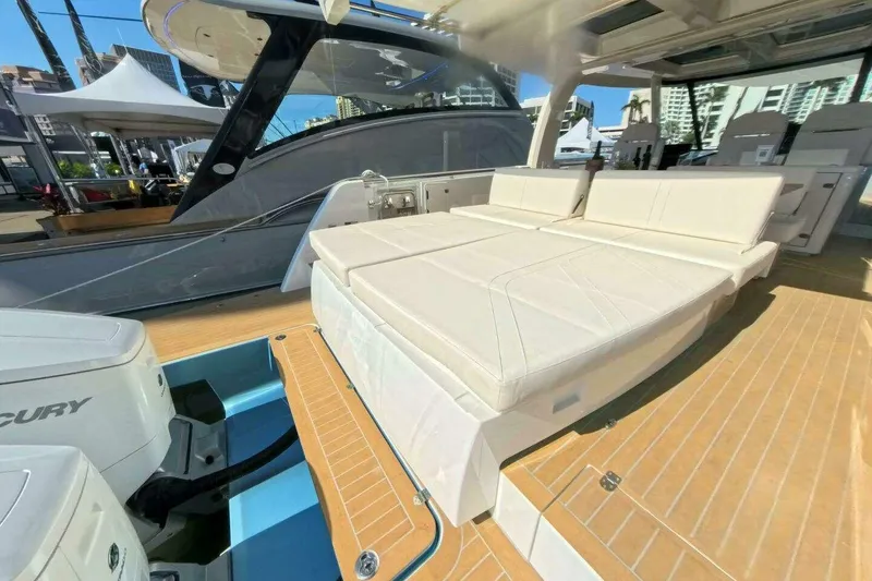 Slide: The Image of Luxurious 2024 Fjord 41XP yacht with spacious deck and comfortable seating. - 6