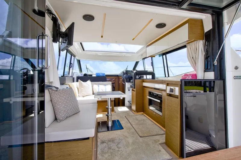 Slide: The Image of Interior of 2020 Jeanneau NC 37 yacht, featuring modern design and luxurious seating. - 11