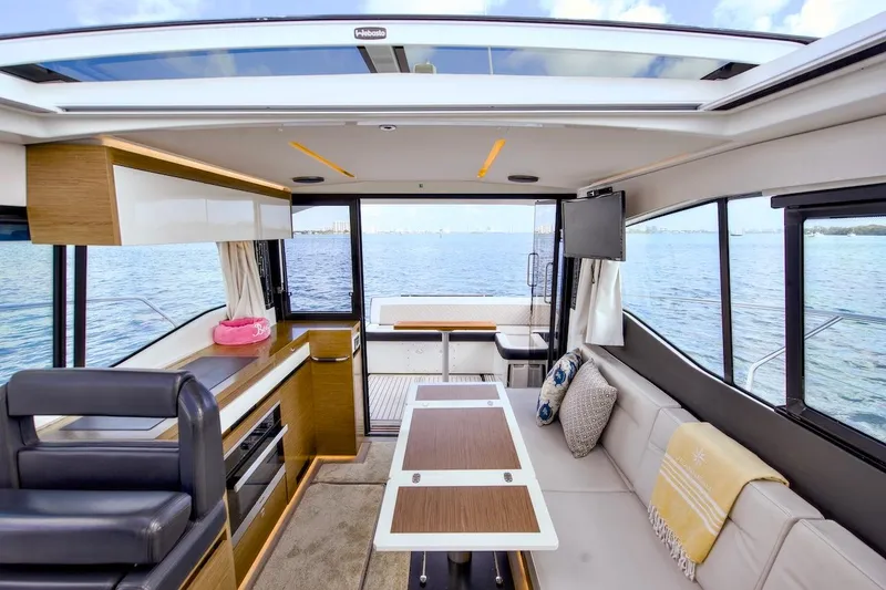 Slide: The Image of Interior of 2020 Jeanneau NC 37 yacht with modern design and ocean view. - 14