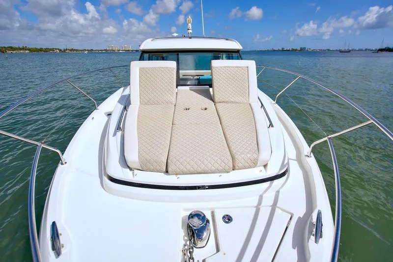 Slide: The Image of 2020 Jeanneau NC 37 yacht with sunbathing deck on calm water. - 7