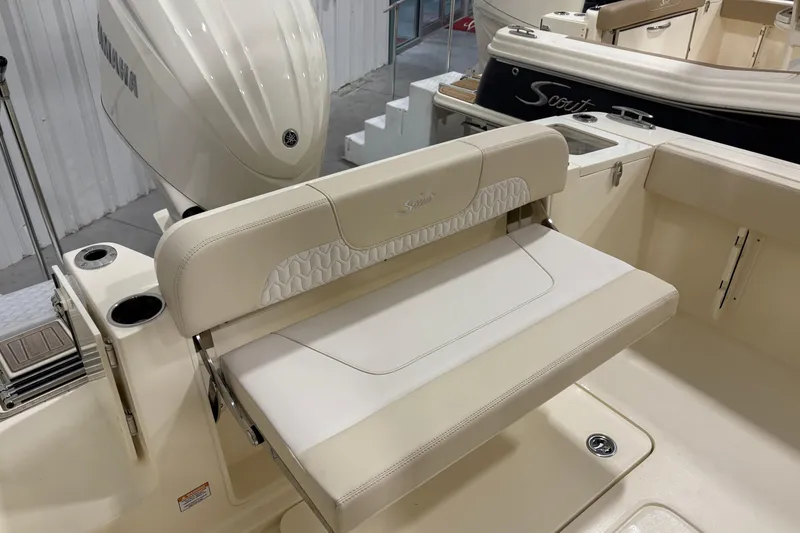 Slide: The Image of 2026 Scout 240 XSF boat interior with Yamaha engine and foldable seating. - 15