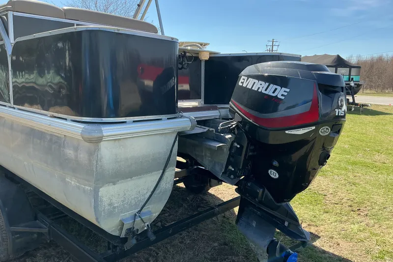 Slide: The Image of 2004 Voyager Pontoons 22 Super Fish & Cruise with Evinrude motor on trailer. - 4