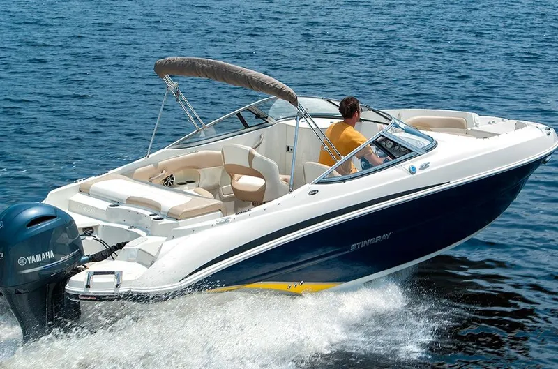Slide: The Image of Manufacturer Provided Image: 2018 Stingray 234 LR boat cruising on water. - 13