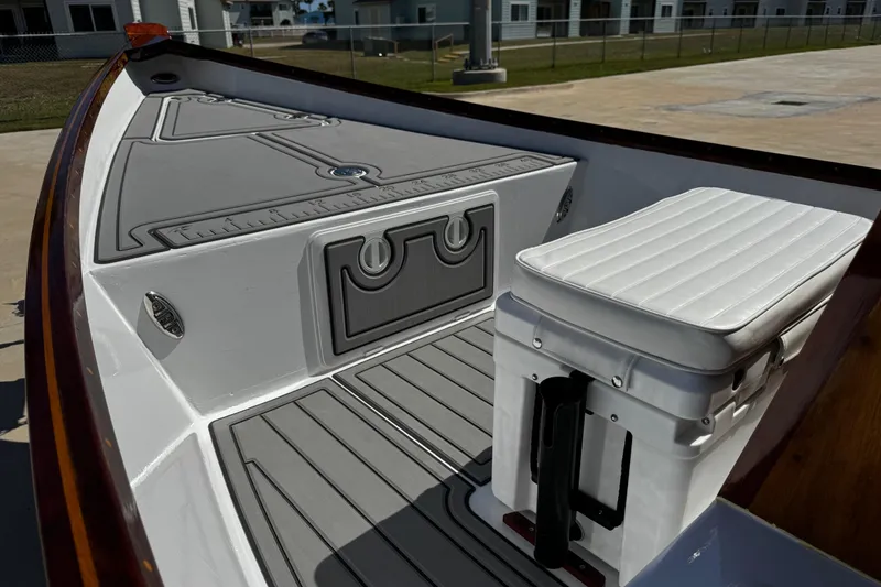 Slide: The Image of 2022 Farley Port A Skiff interior with cushioned seat and non-slip flooring. - 20