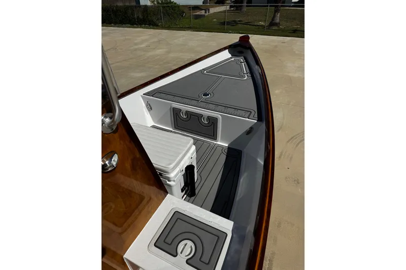 Slide: The Image of 2022 Farley Port A Skiff boat interior with sleek design and storage compartments. - 21