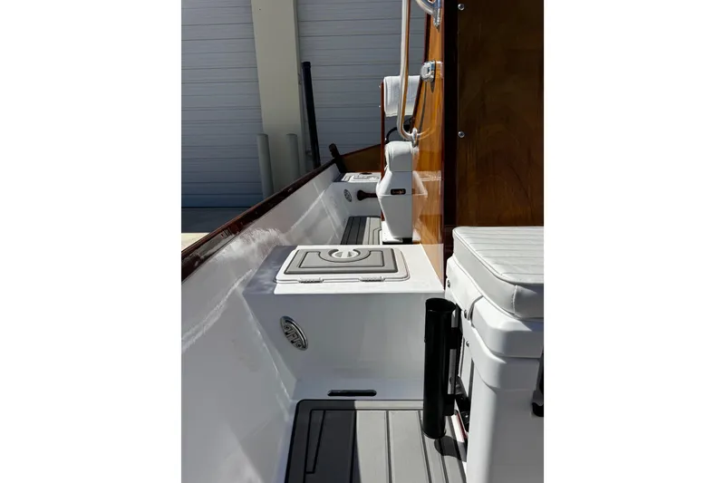 Slide: The Image of 2022 Farley Port A Skiff interior with seating and storage compartments. - 22