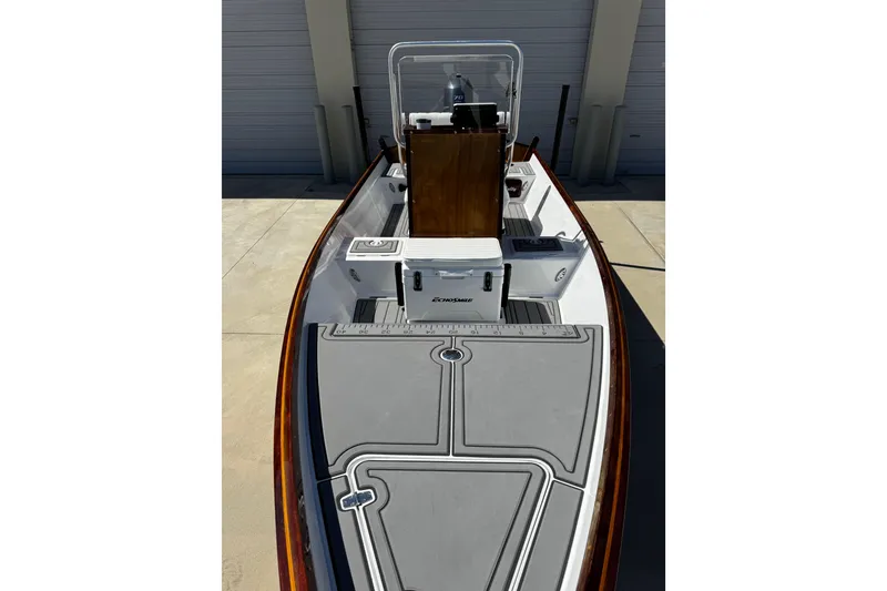 Slide: The Image of 2022 Farley Port A Skiff boat with sleek deck design and modern console. - 28