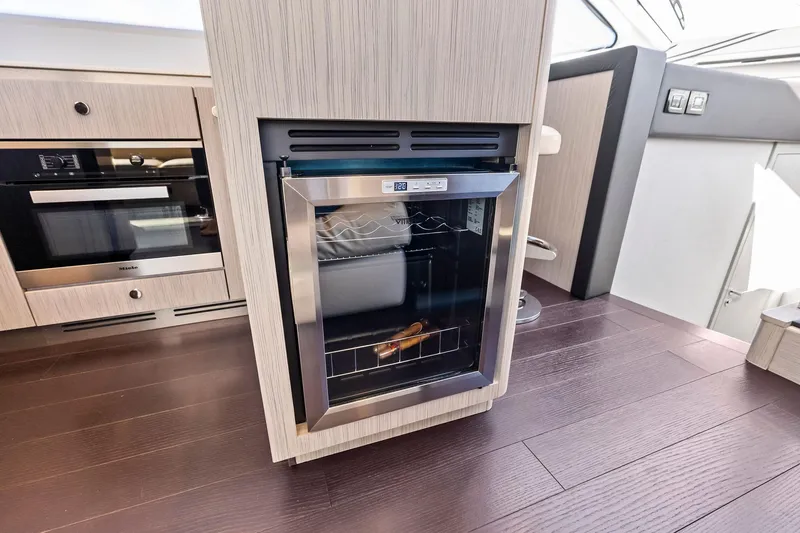 Slide: The Image of Modern kitchen interior on 2020 Azimut 66 yacht with built-in appliances. - 27