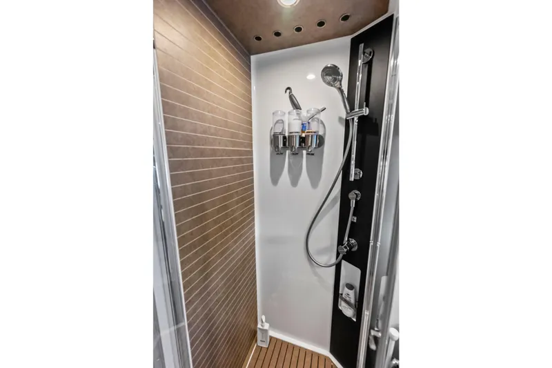 Slide: The Image of Luxurious shower in 2020 Azimut 66 yacht with modern fixtures and wooden flooring. - 39
