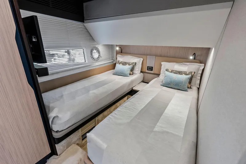 Slide: The Image of Luxurious twin cabin interior of 2020 Azimut 66 yacht with modern decor. - 44
