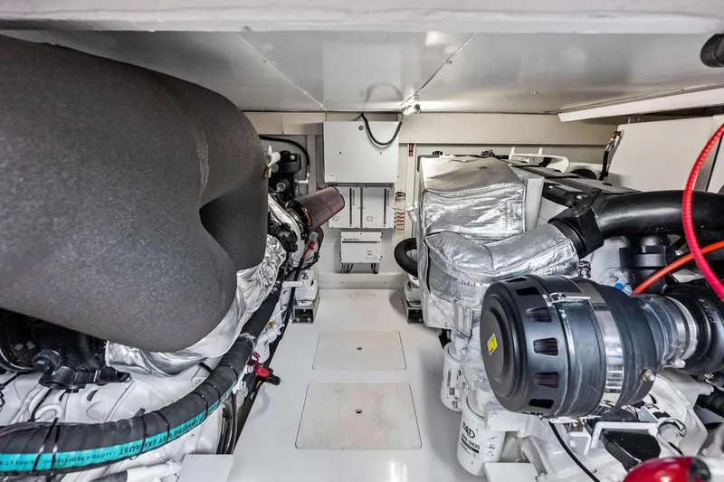 Slide: The Image of Engine room of a 2020 Azimut 66 yacht, showcasing advanced machinery and components. - 50