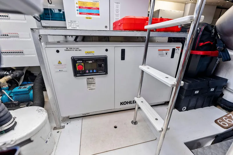 Slide: The Image of Engine room of 2020 Azimut 66 yacht featuring Kohler generator and equipment. - 57