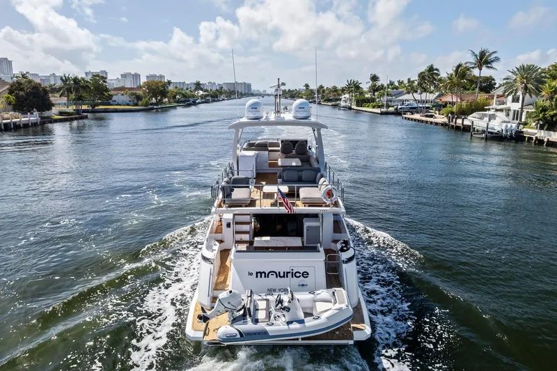 Slide: The Image of Luxury Azimut 66 yacht cruising through a scenic waterway, 2020 model. - 61