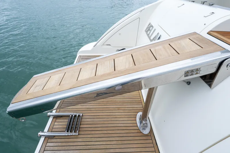 Slide: The Image of Luxury yacht Azimut 62E 2008 with teak swim platform and ladder. - 15