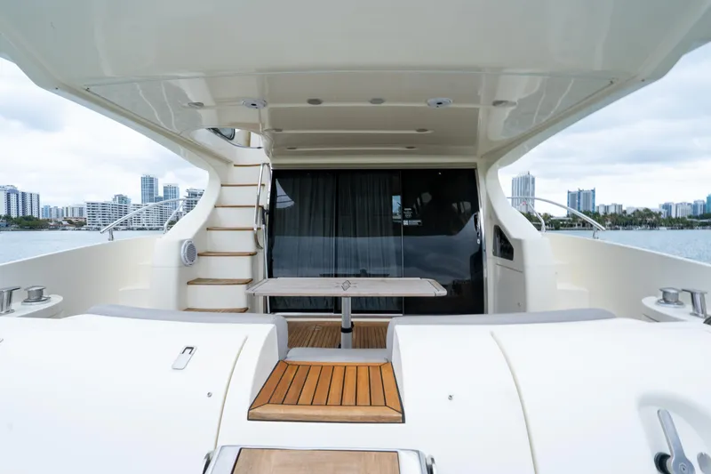 Slide: The Image of 2008 Azimut 62E yacht deck with city skyline in the background. - 16