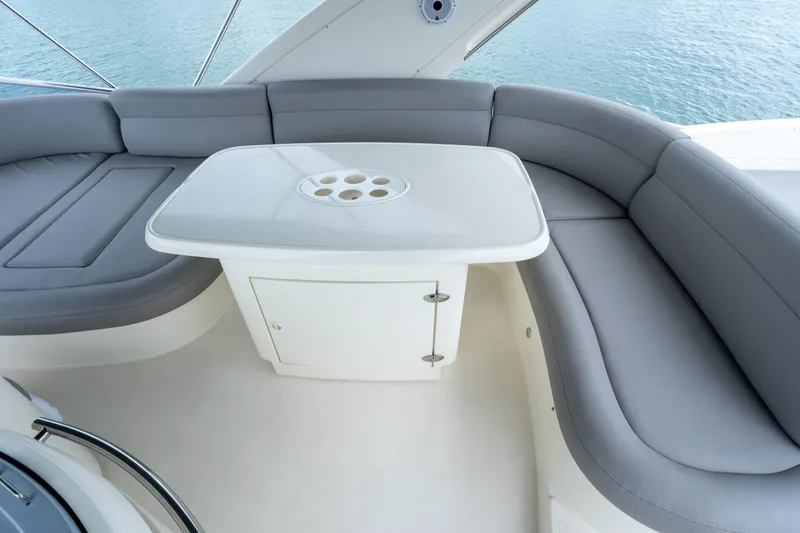 Slide: The Image of Luxurious seating area on 2008 Azimut 62E yacht with sleek gray cushions. - 21