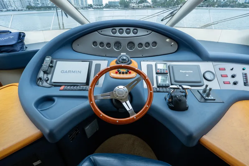 Slide: The Image of 2008 Azimut 62E yacht helm with Garmin and Raymarine navigation systems. - 30