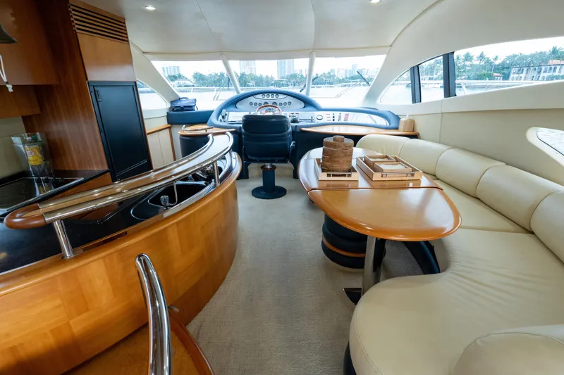 Slide: The Image of Luxurious interior of 2008 Azimut 62E yacht with elegant seating and helm station. - 33