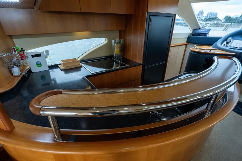 Slide: The Image of Luxurious kitchen interior of a 2008 Azimut 62E yacht with modern amenities. - 35