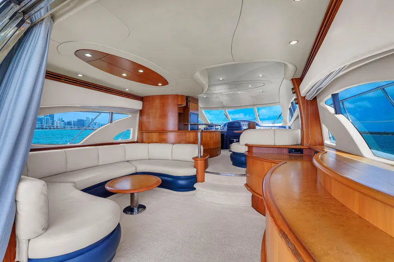 Slide: The Image of Luxurious interior of 2008 Azimut 62E yacht with elegant seating and panoramic windows. - 39