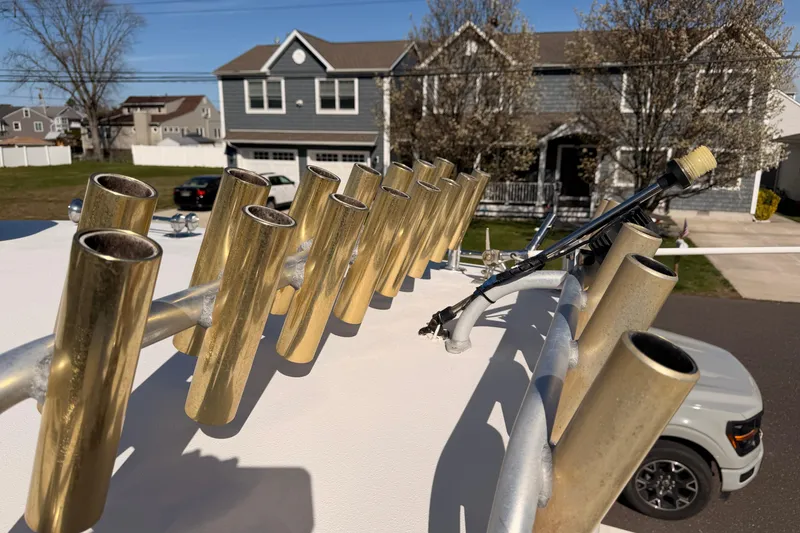 Slide: The Image of Rooftop view of a 2004 Parker 2520 XL Sport Cabin with rod holders. - 24