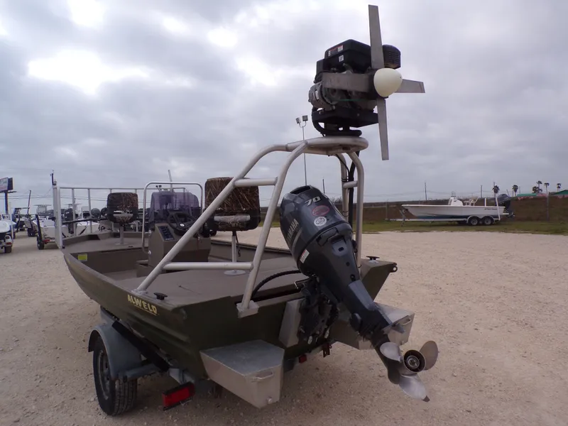 Slide: The Image of 2022 Alweld 1960V boat with outboard motor on trailer. - 12