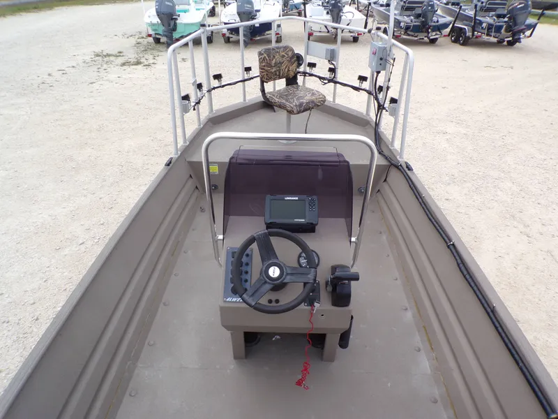 Slide: The Image of Interior view of a 2022 Alweld 1960V boat with steering console. - 17