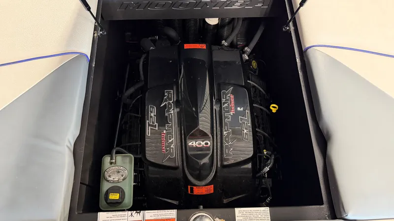 Slide: The Image of Engine compartment of a 2016 Moomba Mojo boat featuring a powerful engine. - 22