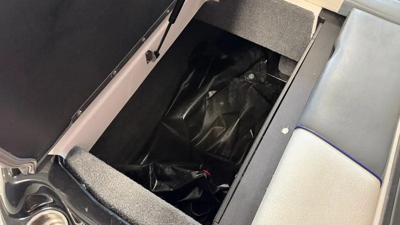 Slide: The Image of Storage compartment inside a 2016 Moomba Mojo boat. - 15