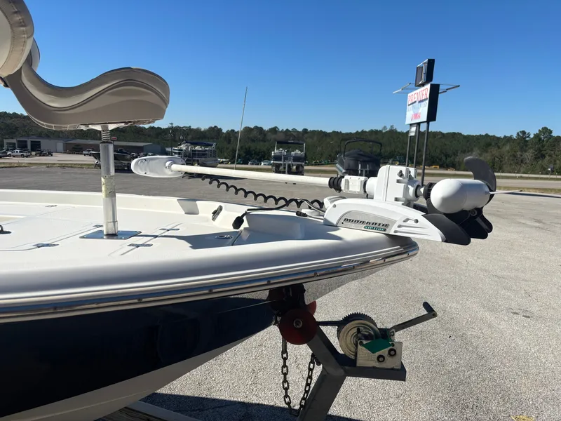 Slide: The Image of 2017 NauticStar 215 XTS boat on a trailer. - 11
