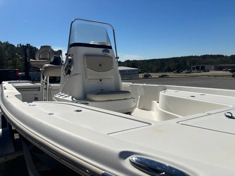 Slide: The Image of 2017 NauticStar 215 XTS boat on trailer in sunny weather. - 12