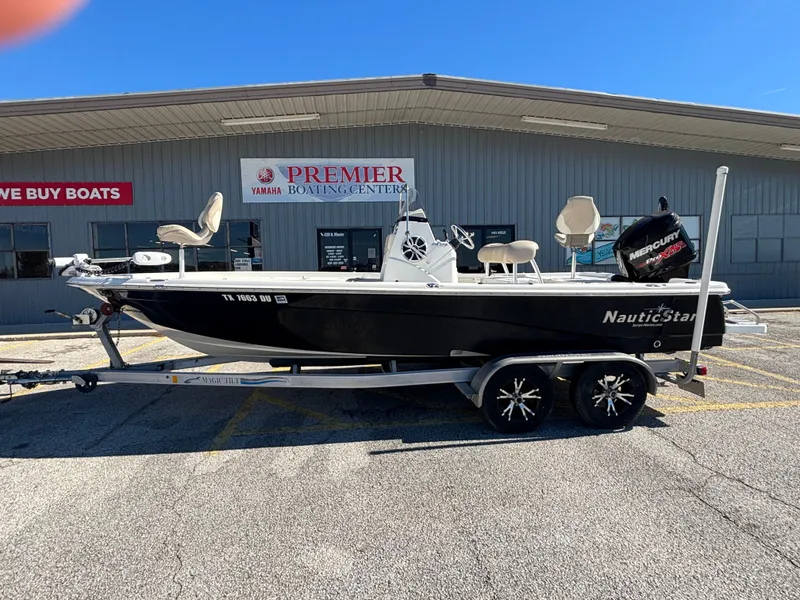 Slide: The Image of 2017 NauticStar 215 XTS boat at Premier Boating Center. - 3