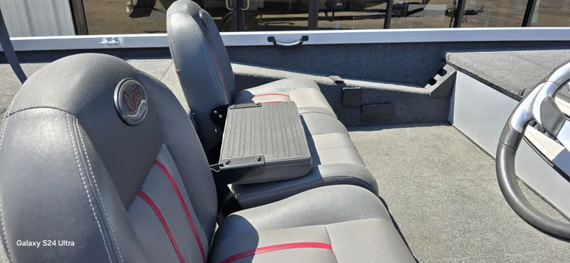 Slide: The Image of Interior of a 2014 Ranger RT188 boat with gray seats. - 12