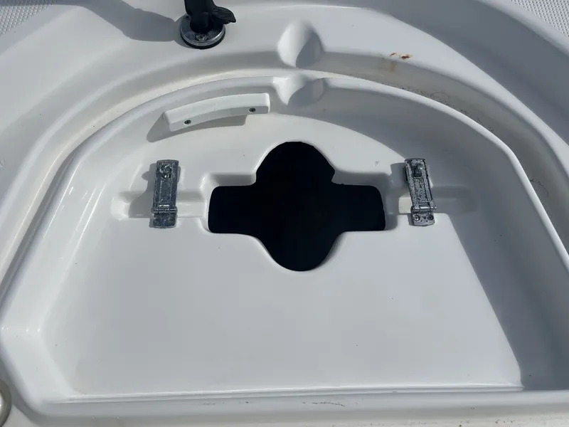 Slide: The Image of Open storage compartment lid on a 2013 Sea Fox 180XT boat. - 15