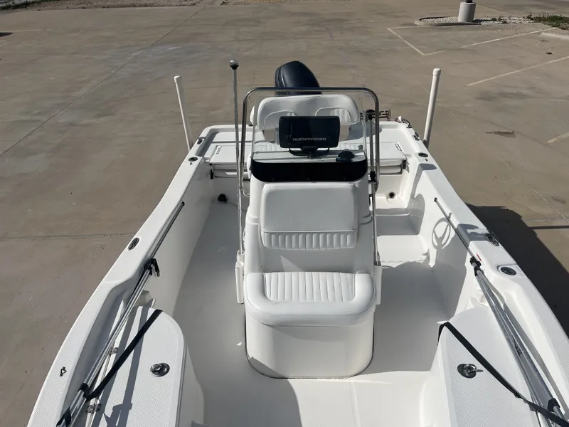 Slide: The Image of Interior view of a 2013 Sea Fox 180XT boat on a parking lot. - 17
