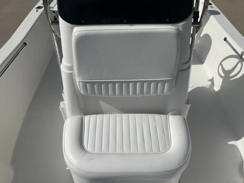 Slide: The Image of Interior of a 2013 Sea Fox 180XT with white seating. - 18