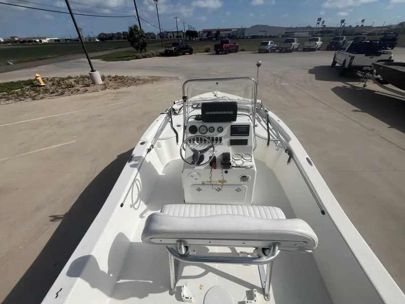 Slide: The Image of Interior view of a 2013 Sea Fox 180XT boat on a parking lot. - 24