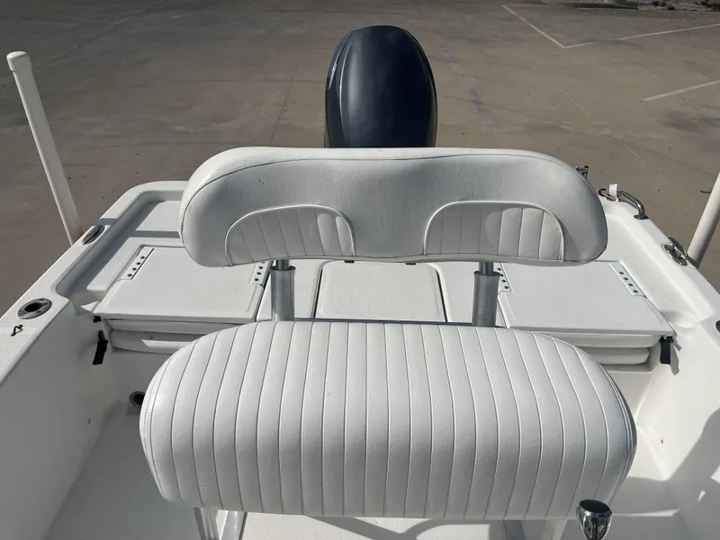Slide: The Image of 2013 Sea Fox 180XT boat seat with white upholstery. - 26