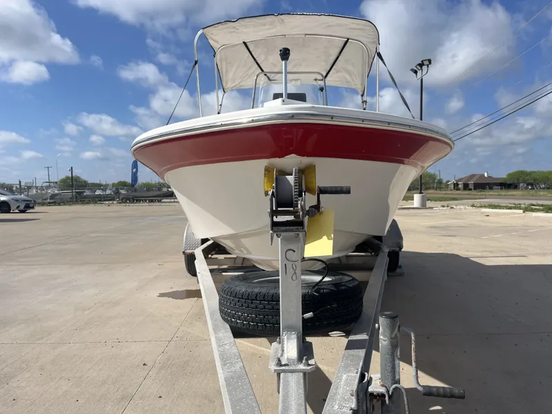 Slide: The Image of 2013 Sea Fox 180XT boat on trailer under sunny skies. - 5